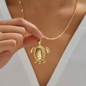 Turtles 18 K gold plated over stainless steel necklace